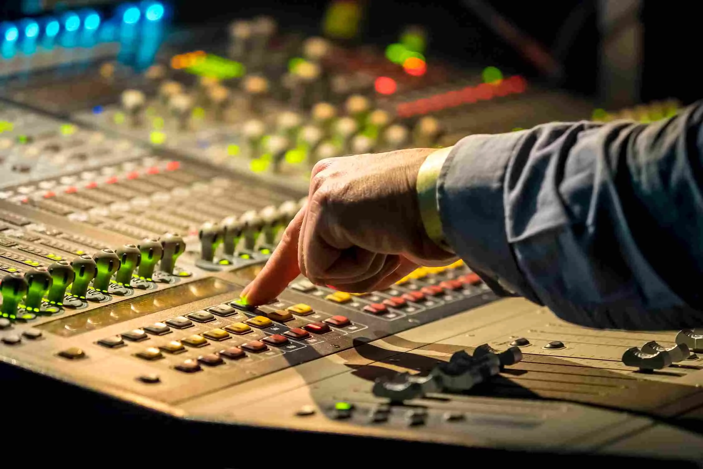 cropped-hand-male-dj-pressing-push-button-control-panel-music-concert_11zon